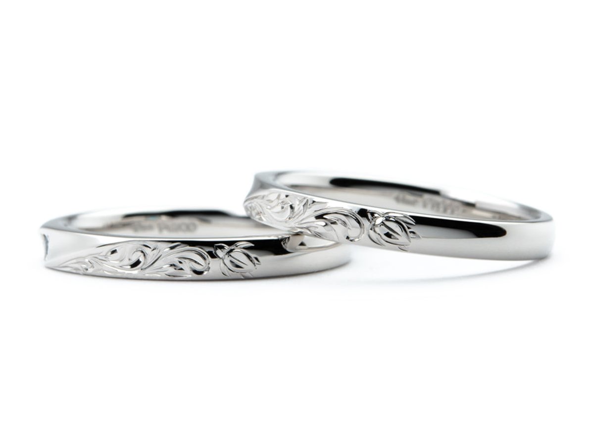 お互いの誕生石をお留めしたひねり×ハワイアン彫りの手作り結婚指輪 2