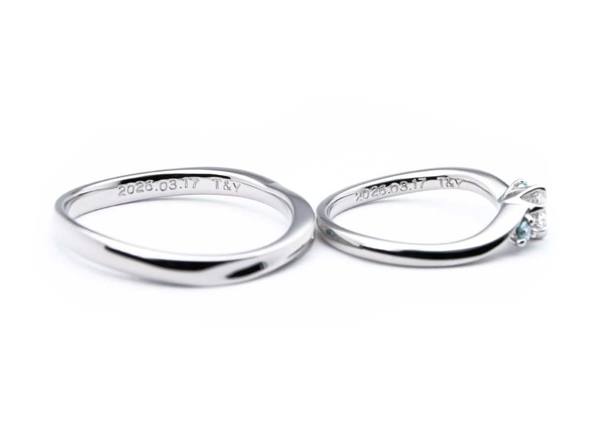 ブルーを取り入れたふたひねりと大きなダイヤがついたオーダーメイド結婚指輪 2